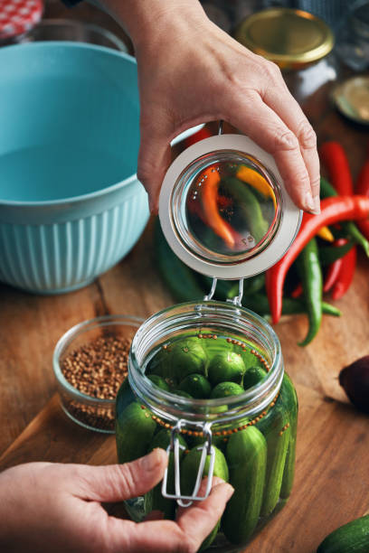 istock Fermented Foods - Preparing Fermented Cucumbers with Spices 2200634216