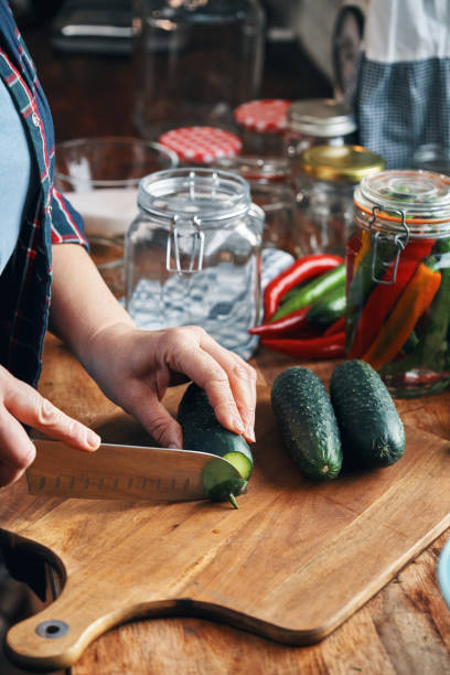 istock Fermented Foods - Preparing Fermented Cucumbers with Spices 2200634375