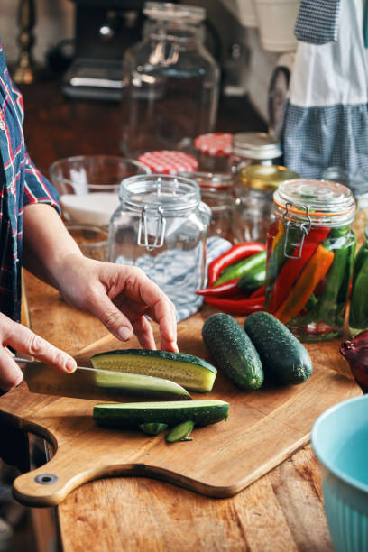 istock Fermented Foods - Preparing Fermented Cucumbers with Spices 2200634407