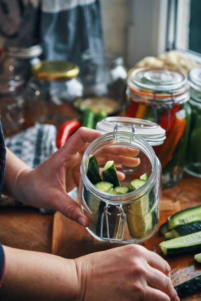 istock Fermented Foods - Preparing Fermented Cucumbers with Spices 2200634730