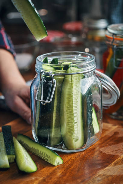 istock Fermented Foods - Preparing Fermented Cucumbers with Spices 2200634751
