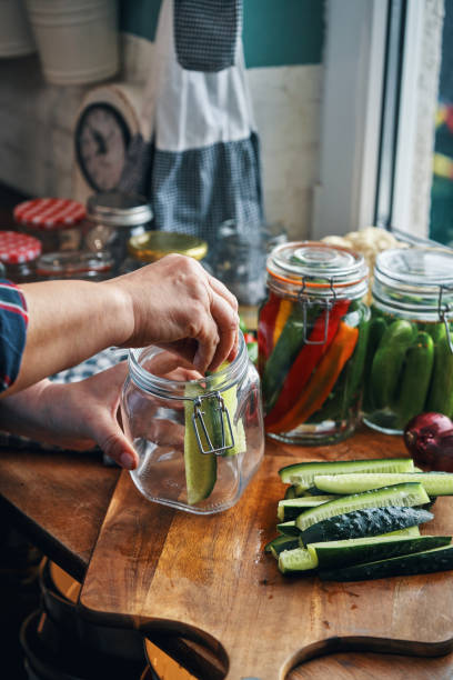 istock Fermented Foods - Preparing Fermented Cucumbers with Spices 2200634854