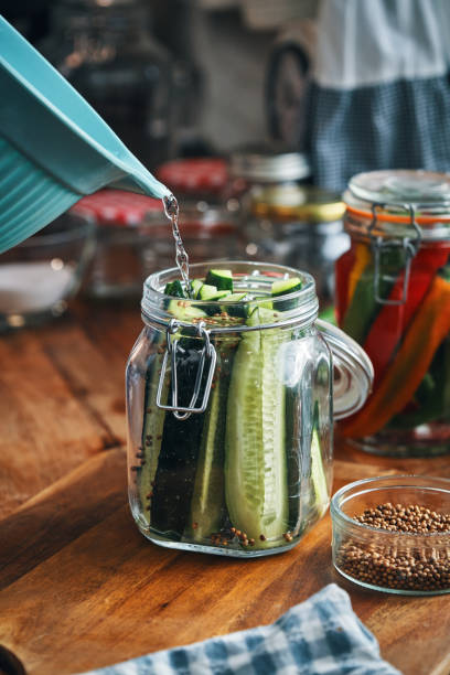 istock Fermented Foods - Preparing Fermented Cucumbers with Spices 2200634990