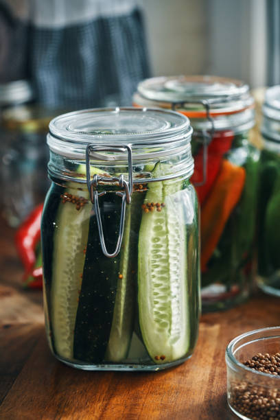 istock Fermented Foods - Preparing Fermented Cucumbers with Spices 2200635076