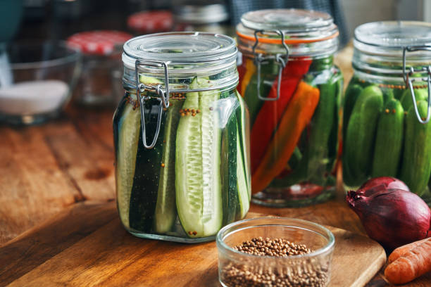 istock Fermented Foods - Preparing Fermented Cucumbers with Spices 2200635077