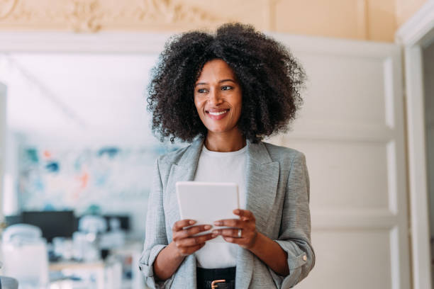istock Confident businesswoman in modern office. 2200635460
