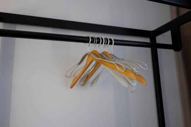 Hanging hangers in the room
