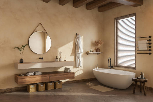 Wabi Sabi Style Bathroom With Bathtub, Folded Towels And Hanging Bathrobe