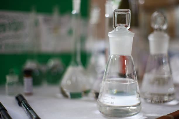 Chemical flask with reagent in old laboratory