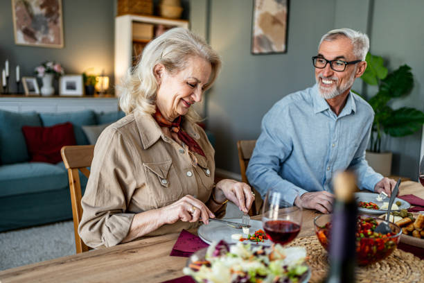 istock Senior couple having lunch together 2200645907