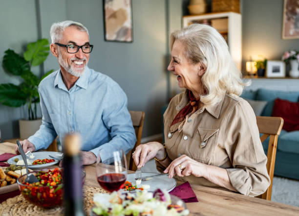 istock Senior couple having lunch together 2200645950