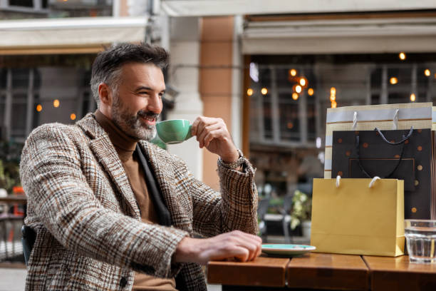 istock Relaxed Shopper Enjoying a Drink After Shopping 2200646727