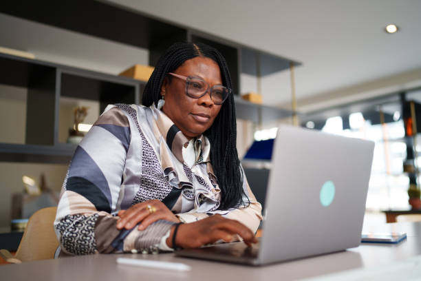 istock Businesswoman using laptop at the office. 2200650097
