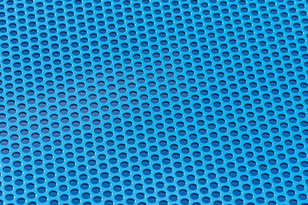 Germany, Berlin, July 07, 2024 - Perforated metal plate in blue color