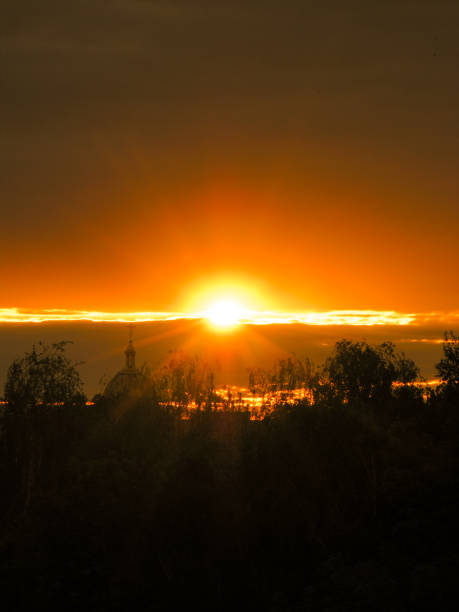 istock silhouette of a dome and trees against a beautiful sunset sky 2200660518