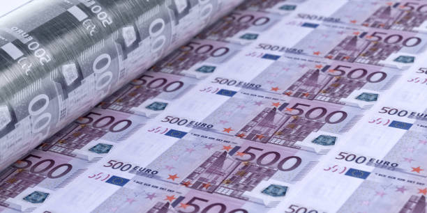 istock Euro banknotes printing, 500 euro sheet closeup 2200661167