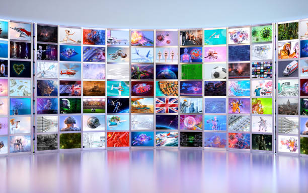 istock Curved video wall with multiple screens displaying various images. Modern media, technology, breaking news 2200663411