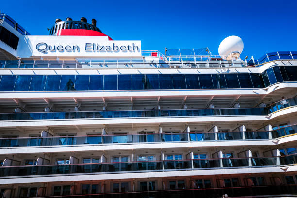 Vancouver, Canada - August 17, 2023: Cruise ship Queen Elizabeth laying at a modern pier in Vancouver in Canada.