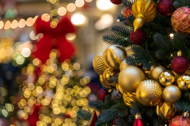 istock Christmas decorations sparkle with gold ornaments in festive celebration 2200668307