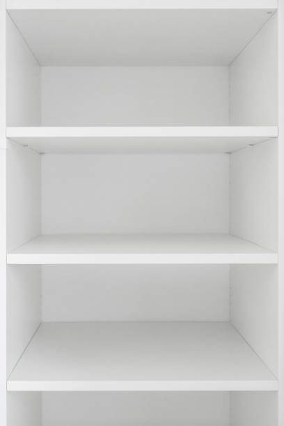 istock Simple minimalistic storage shelves made of wooden particleboard material, empty shelf as copy space 2200671209