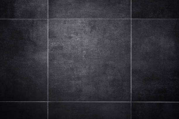 istock Texture of dark grey flooring ceramic tiles as background 2200671271