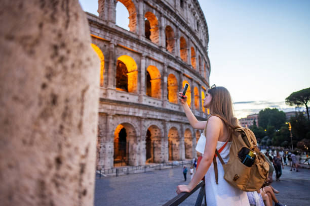 istock Woman Capturing the Colosseum on Camera 2200674829