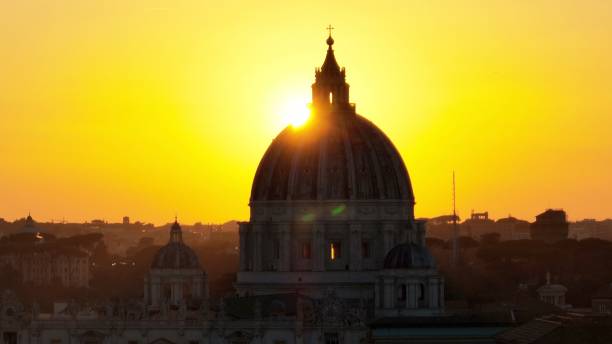 Rome, Italy - 29 January 2025: Backlit close-up of St. Peter's Dome. Evocative image for the Jubilee.