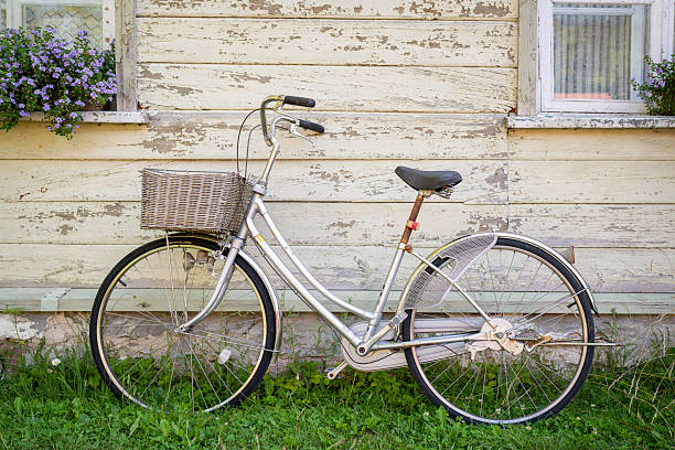 istock Old bike leaning against wall. 2200678449