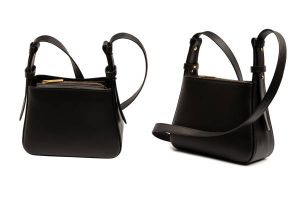 istock Black small leather cross body bag isolated on a white background. 2200684644