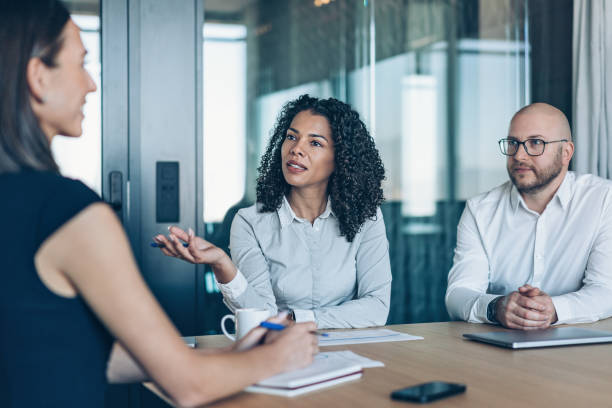 istock Business persons talking during a meeting 2200700331