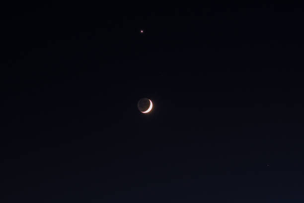 istock Photo of Moon, Jupiter and stars 2200701421