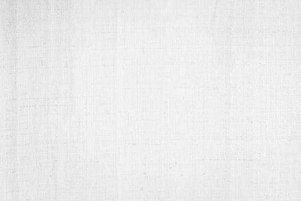 White color fabric canvas woven texture background in pattern light blank. Natural gauze linen, carpet wool and cotton cloth textile textured as clean empty for decoration text. Grey sack material.