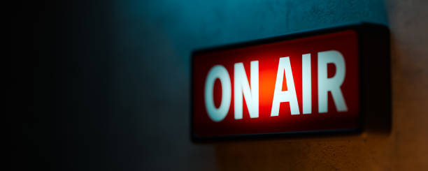 istock Live sign in a broadcast studio with the words on air.3d rendering 2200727372