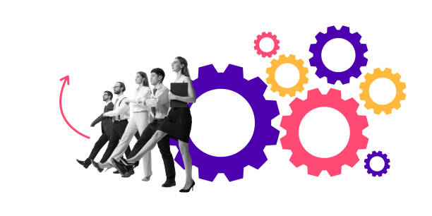 istock Group of business professionals marching forward, supported by moving gears, symbolizing teamwork, progress, and structured corporate development. 2200729292