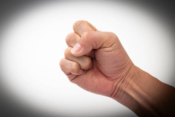 Right hand clenched on white background