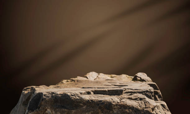 istock Rock, Stone podium stand display advertising product, Production show with studio dark light wall room background well free space for text, Cliff rock stone stage, Clipping paths 2200748849
