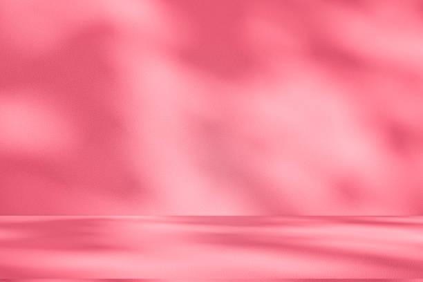 istock Wall interior background, studio, and backdrops show products. with shadow from window color white and pink light. background for text insertion and presentation of product 2200749235