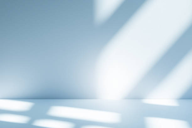 istock Studio style background wall decoration presentation uses white and blue tones. with shadows cast from a nearby window, concept creating a decorative 2200749337