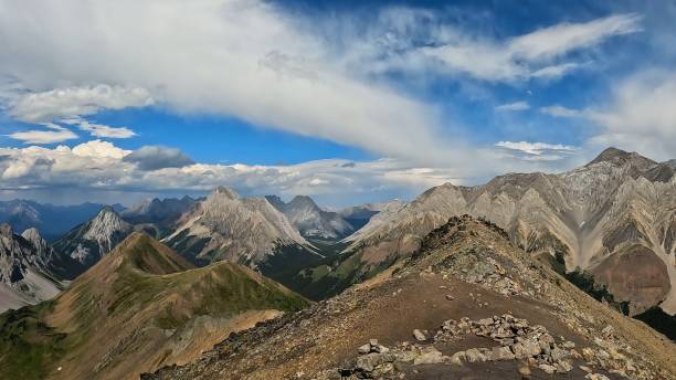 istock Rugged mountain peaks under a vibrant blue sky. 2200750019