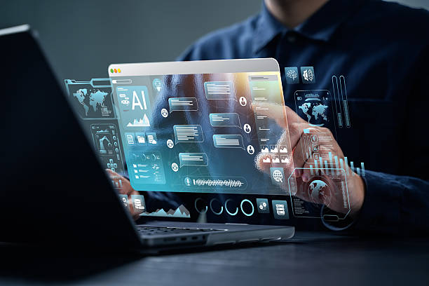 istock AI content creation tools: Man uses laptop with AI assistant for graphic design, translation, chatbot, image creation, coding, and advertising. 2200750639