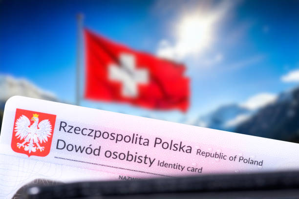 istock Flag at the border with Switzerland and a Polish identity card 2200763512