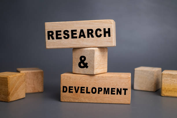istock research and development words symbol on wooden blocks isolated on grey background 2200768003