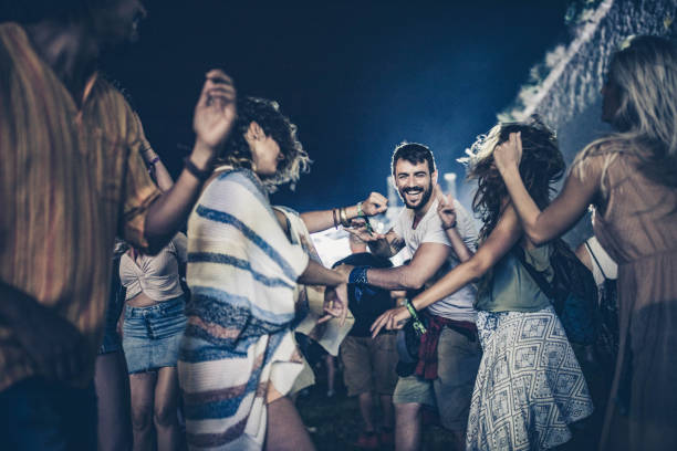 istock Dancing on music festival by night! 2200770149