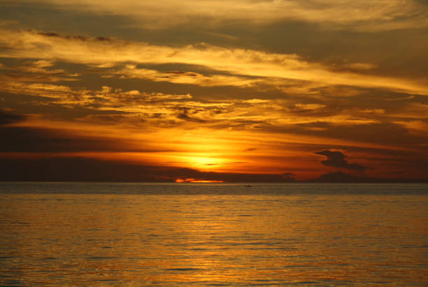 Beautiful cloudscape over the sea, sunset shot.