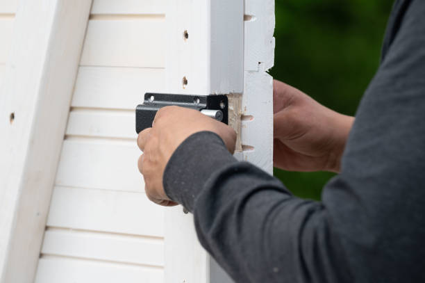 istock Installing a small door lock for a room in a gazebo. 2200774576