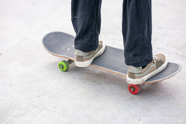 istock Young Woman Skateboarding On Street 2200775201