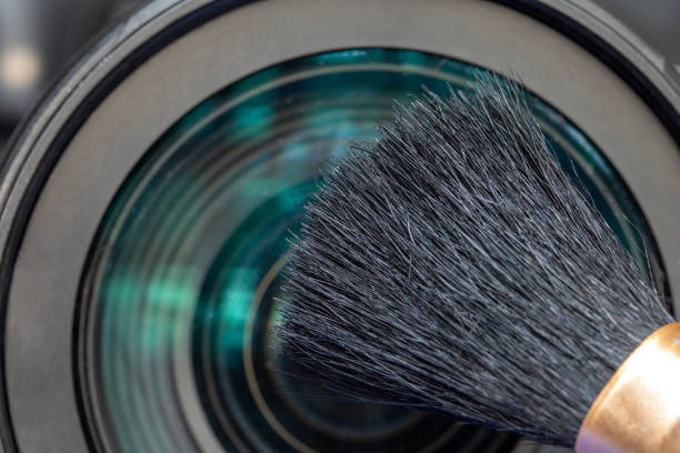 Brush on a white background with a magnifying glass.