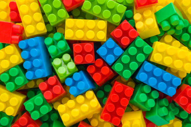 istock Background of heap colorful plastic blocks. Closeup. Top down view. 2200777675