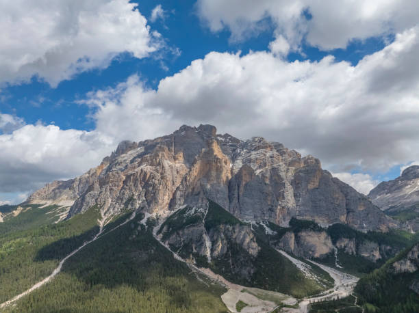 Dolomites landscape with the  Cunturines Spitze / Piz dles Conturines in the background durint a beautiful springtime day in South Tyrol.