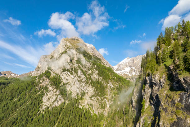 Fonch de Ombreta and Punta Penia in the Marmolada mountains in the Dolomites during springtime in Veneto Italy.